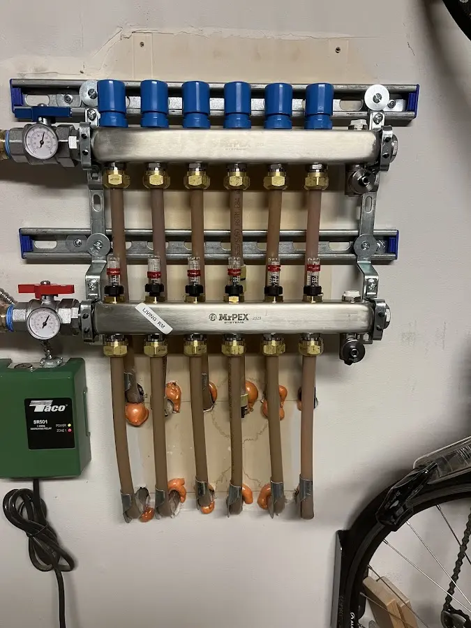 Plumber performing Leak Detection at a residential property in Brillion